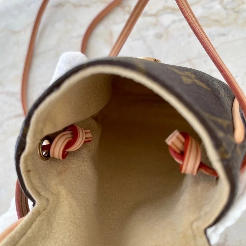 LOUIS VUITTON CANCUN POCHETTE NEW